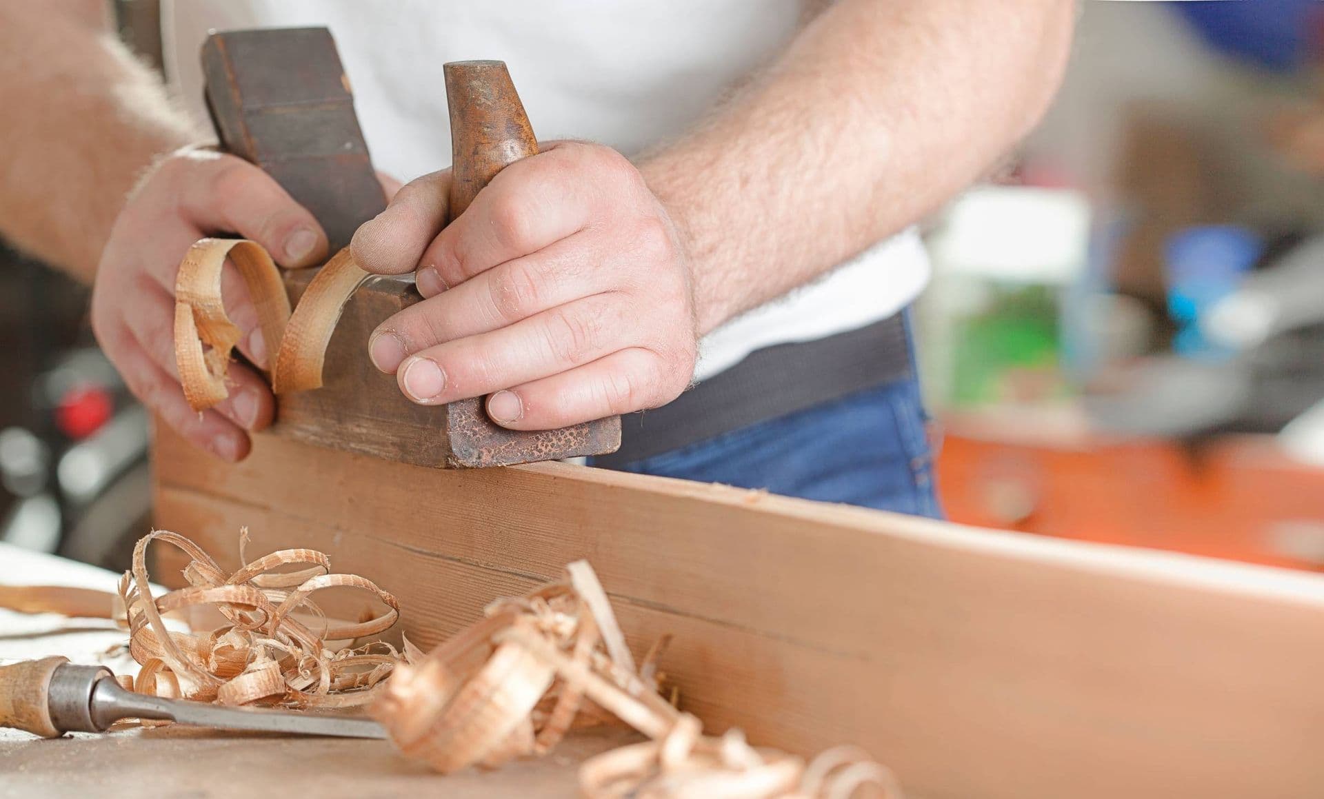 imgi_1_1696201283312-carpenter-using-plane.jpg